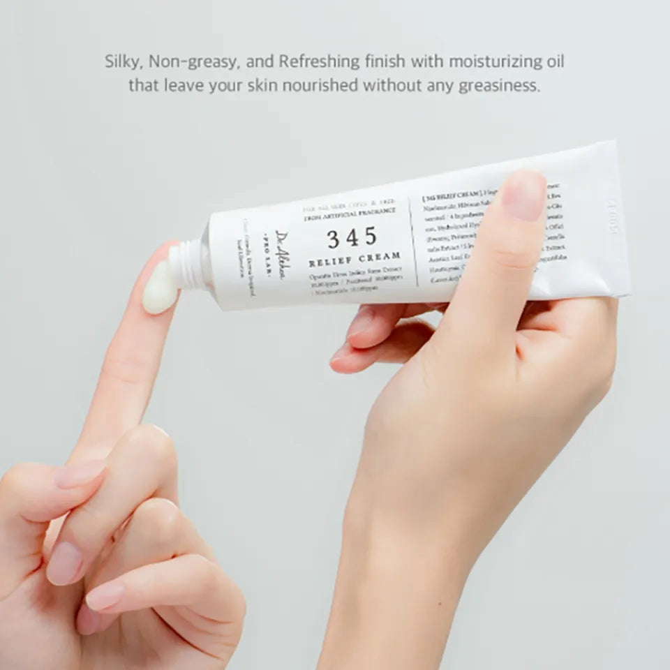 "Hand holding jar of moisturizing cream designed for sensitive and irritated skin"